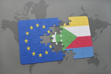 bir dünya haritası arka plan üzerinde Avrupa Birliği ve komorulusal bayrağı ile bulmaca.