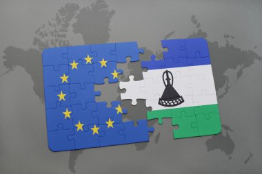 bir dünya haritası arka plan üzerinde Avrupa Birliği ve lesotho ulusal bayrağı ile bulmaca.