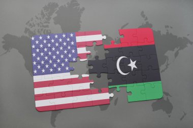 bir dünya haritası arka plan üzerinde Amerika ve Libya birleşik devletlerinin ulusal bayrağı ile bulmaca.