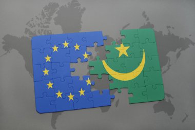 bir dünya haritası arka plan üzerinde Avrupa Birliği ve Moritanya ulusal bayrağı ile bulmaca.