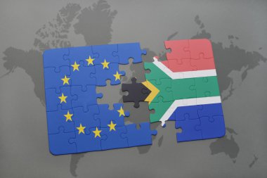 Avrupa Birliği ve Güney Afrika Dünya harita arka plan üzerinde bayrağı ile bulmaca.