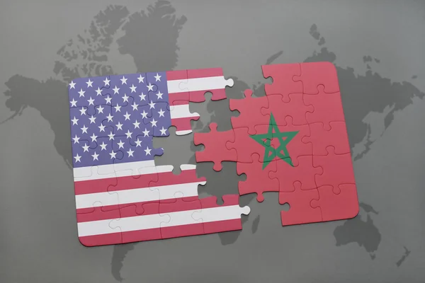 Puzzle with the national flag of united states of america and morocco on a world map background. — Stock Photo, Image