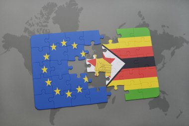 Avrupa Birliği ve Zimbabve Ulusal bayrak dünya harita arka plan üzerinde ile bulmaca.