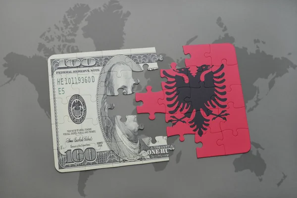 Puzzle with the national flag of albania and dollar banknote on a world map background. — Stock Photo, Image