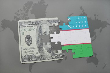 Özbekistan ve Doları banknot dünya harita arka plan üzerinde bayrağı ile bulmaca.