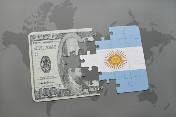 Puzzle z Flaga narodowa banknot Dolar i Argentyna na tle mapy świata. — Zdjęcie stockowe