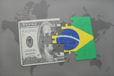 Brezilya ve Doları banknot dünya harita arka plan üzerinde bayrağı ile bulmaca.