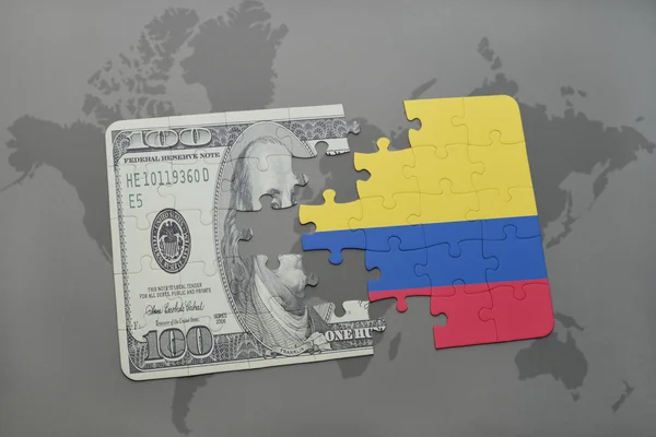 Puzzle with the national flag of colombia and dollar banknote on a world map background. — Stock Photo, Image