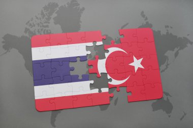 bir dünya haritası arka plan üzerinde tayland ve Türkiye'nin ulusal bayrağı ile bulmaca.