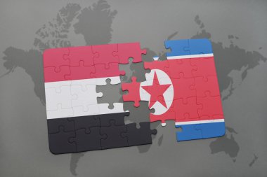 bir dünya haritası arka plan üzerinde Yemen ve Kuzey Kore ulusal bayrağı ile bulmaca.