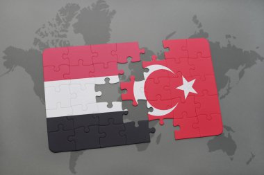 bir dünya haritası arka plan üzerinde yemen ve Türkiye ulusal bayrağı ile bulmaca.