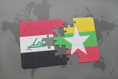 bir dünya haritası arka plan üzerinde Irak ve Myanmar ulusal bayrağı ile bulmaca.
