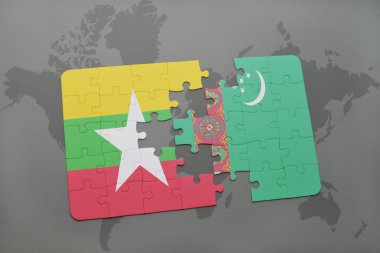 bir dünya haritası arka plan üzerinde myanmar ve Türkmenistan ulusal bayrağı ile bulmaca.