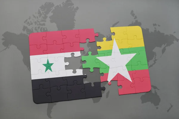 Головоломка з національним прапором Сирії і М'янми на карті світу. — стокове фото