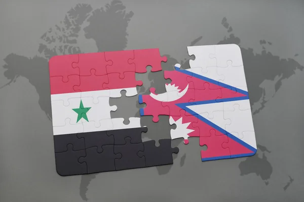Головоломка з національним прапором Сирії та Непалу на карті світу. — стокове фото
