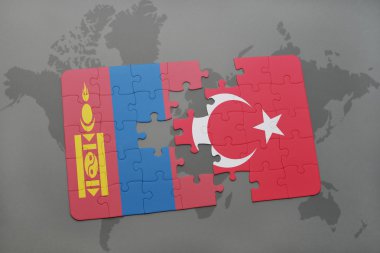 bir dünya haritası arka plan üzerinde moğolistan ve Türkiye ulusal bayrağı ile bulmaca.