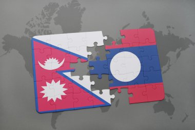 bir dünya haritası arka plan üzerinde nepal ve laos ulusal bayrağı ile bulmaca.