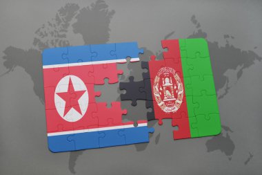 bir dünya haritası arka plan üzerinde Kuzey Kore ve Afganistan ulusal bayrağı ile bulmaca.