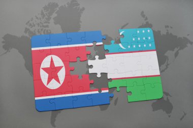 bir dünya haritası arka plan üzerinde Kuzey Kore ve Özbekistan ulusal bayrağı ile bulmaca.