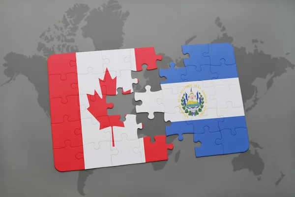 Puzzle z flagi narodowej Kanady i Salwadoru na tle mapy świata. — Zdjęcie stockowe