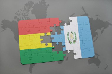 bir dünya haritası arka plan üzerinde bolivya ve guatemala ulusal bayrağı ile bulmaca.