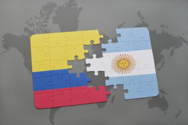 bir dünya haritası arka plan üzerinde kolombiya ve arjantin ulusal bayrağı ile bulmaca.