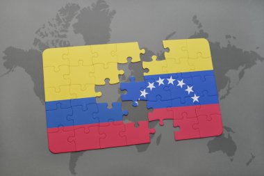 bir dünya haritası arka plan üzerinde kolombiya ve venezuela ulusal bayrağı ile bulmaca.