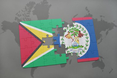 bir dünya haritası arka plan üzerinde guyana ve belize ulusal bayrağı ile bulmaca.