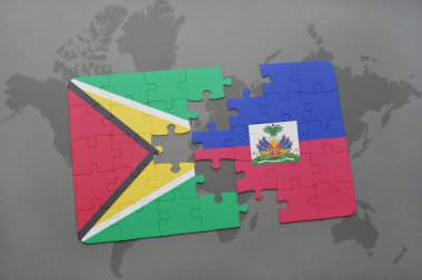 bir dünya haritası arka plan üzerinde guyana ve haiti ulusal bayrağı ile bulmaca.