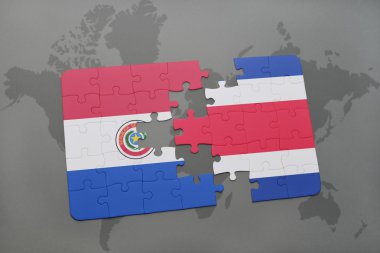 bir dünya haritası arka plan üzerinde paraguay ve kosta rika ulusal bayrağı ile bulmaca.