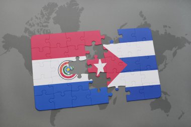 bir dünya haritası arka plan üzerinde paraguay ve küba ulusal bayrağı ile bulmaca.