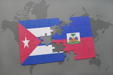 bir dünya haritası arka plan üzerinde Küba ve Haiti ulusal bayrağı ile bulmaca.