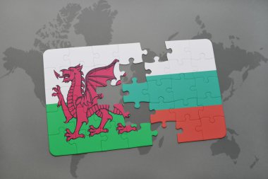 bir dünya haritası arka plan üzerinde galler ve bulgaristan ulusal bayrağı ile bulmaca.