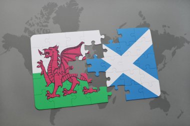 Galler ve İskoçya ulusal bayrak dünya harita arka plan üzerinde ile bulmaca.