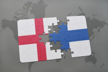 bir dünya haritası arka plan üzerinde İngiltere ve Finlandiya ulusal bayrağı ile bulmaca.
