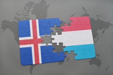bir dünya haritası arka plan üzerinde İzlanda ve Lüksemburg ulusal bayrağı ile bulmaca.