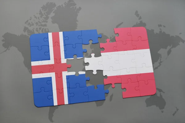 Головоломка з національним прапором Ісландії та Австрії на карті світу. — стокове фото