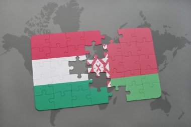 bir dünya haritası arka plan üzerinde Macaristan ve Beyaz Rusya ulusal bayrağı ile bulmaca.