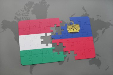 bir dünya haritası arka plan üzerinde Macaristan ve lihtenştayn ulusal bayrağı ile bulmaca.
