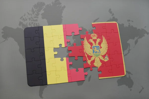 Quebra-cabeça com a bandeira nacional da Bélgica e da Tailândia em um fundo de mapa do mundo . — Fotografia de Stock