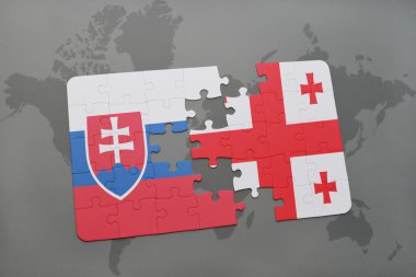 Slovakya ve Gürcistan ulusal bayrak dünya harita arka plan üzerinde ile bulmaca.