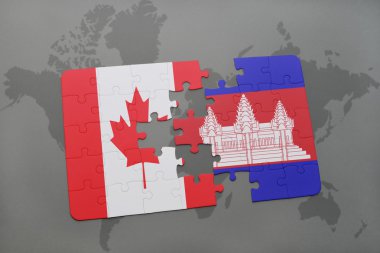 bir dünya haritası arka plan üzerinde Kanada ve Kamboçya ulusal bayrağı ile bulmaca.