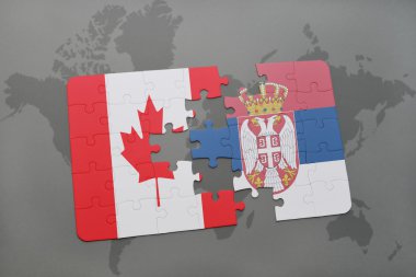 bir dünya haritası arka plan üzerinde Kanada ve Sırbistan ulusal bayrağı ile bulmaca.