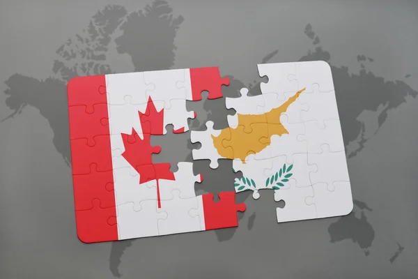 Pussel med den nationella flaggan i Kanada och Cypern på en världskarta bakgrund. — Stockfoto