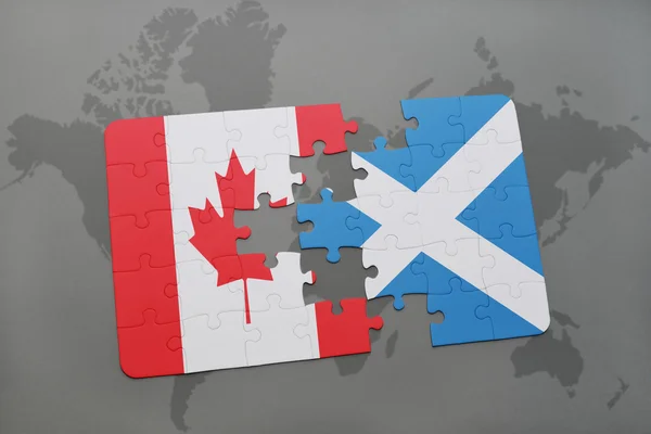 Puzzle con la bandiera nazionale del Canada e della Scozia su uno sfondo mappa del mondo . — Foto Stock
