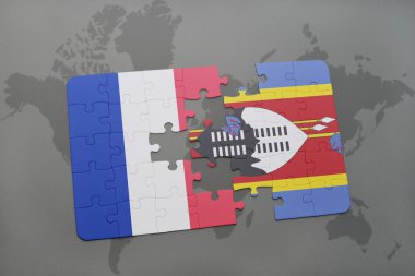 bir dünya haritası arka plan üzerinde Fransa ve svaziland ulusal bayrağı ile bulmaca.