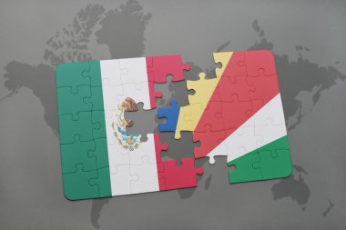 bir dünya haritası arka plan üzerinde meksika ve seyşeller ulusal bayrağı ile bulmaca.