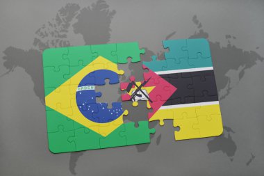 bir dünya haritası arka plan üzerinde Brezilya ve mozambik ulusal bayrağı ile bulmaca.