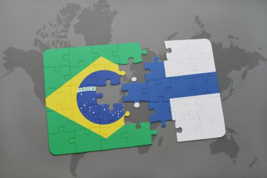 bir dünya haritası arka plan üzerinde Brezilya ve Finlandiya ulusal bayrağı ile bulmaca.