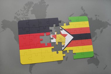 bir dünya haritası arka plan üzerinde Almanya ve zimbabve ulusal bayrağı ile bulmaca.